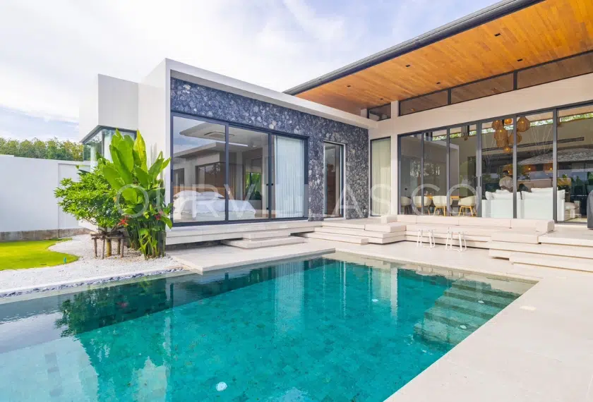 Exclusive Modern Pool Villa in Phuket: Modern villa with a private pool and lush greenery.