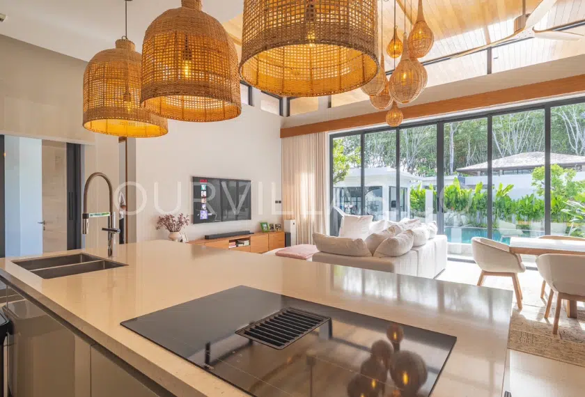 Elegant kitchen with pendant lighting.