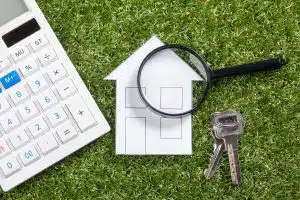 Property Management Company in Phuket: Property management tools on grass background.