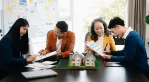 Property Management Services in Phuket: Real estate agents discussing property management services.