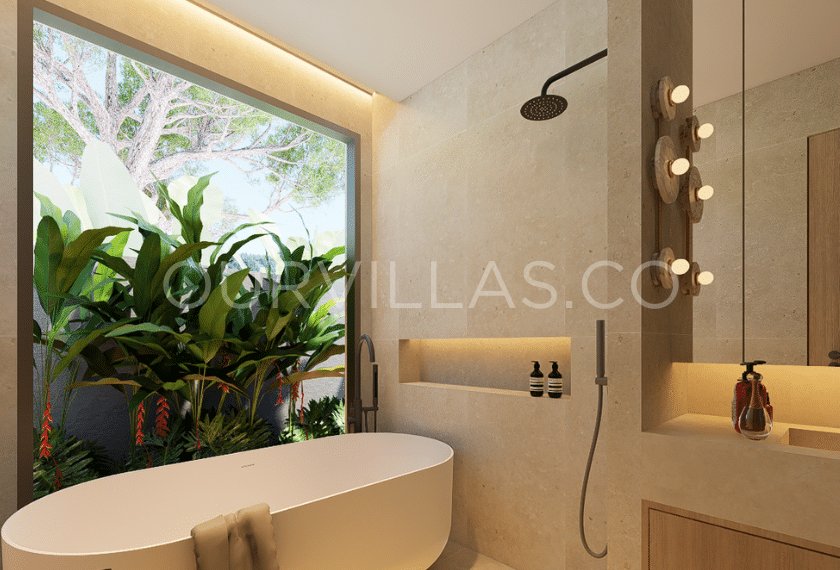 Modern bathroom with garden view and soaking tub