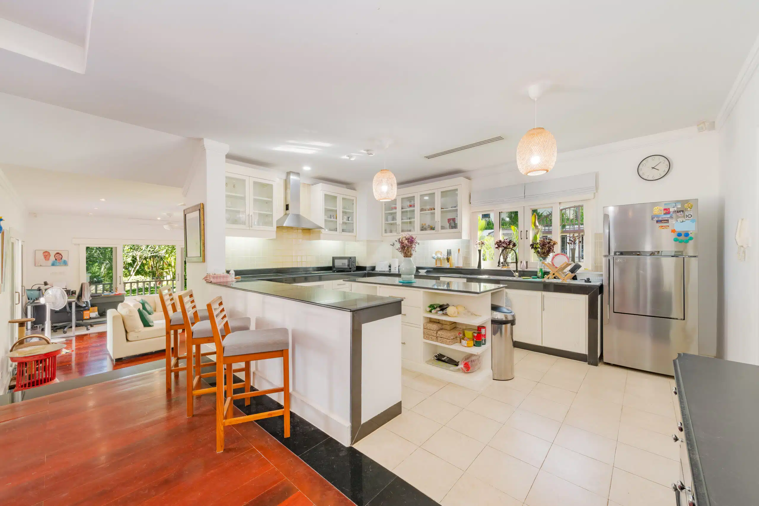 Kitchen with breakfast bar and wood cabinetry