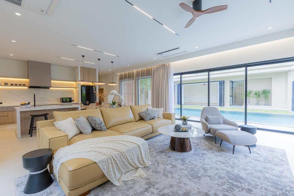 Modern living area with pool view and stylish décor