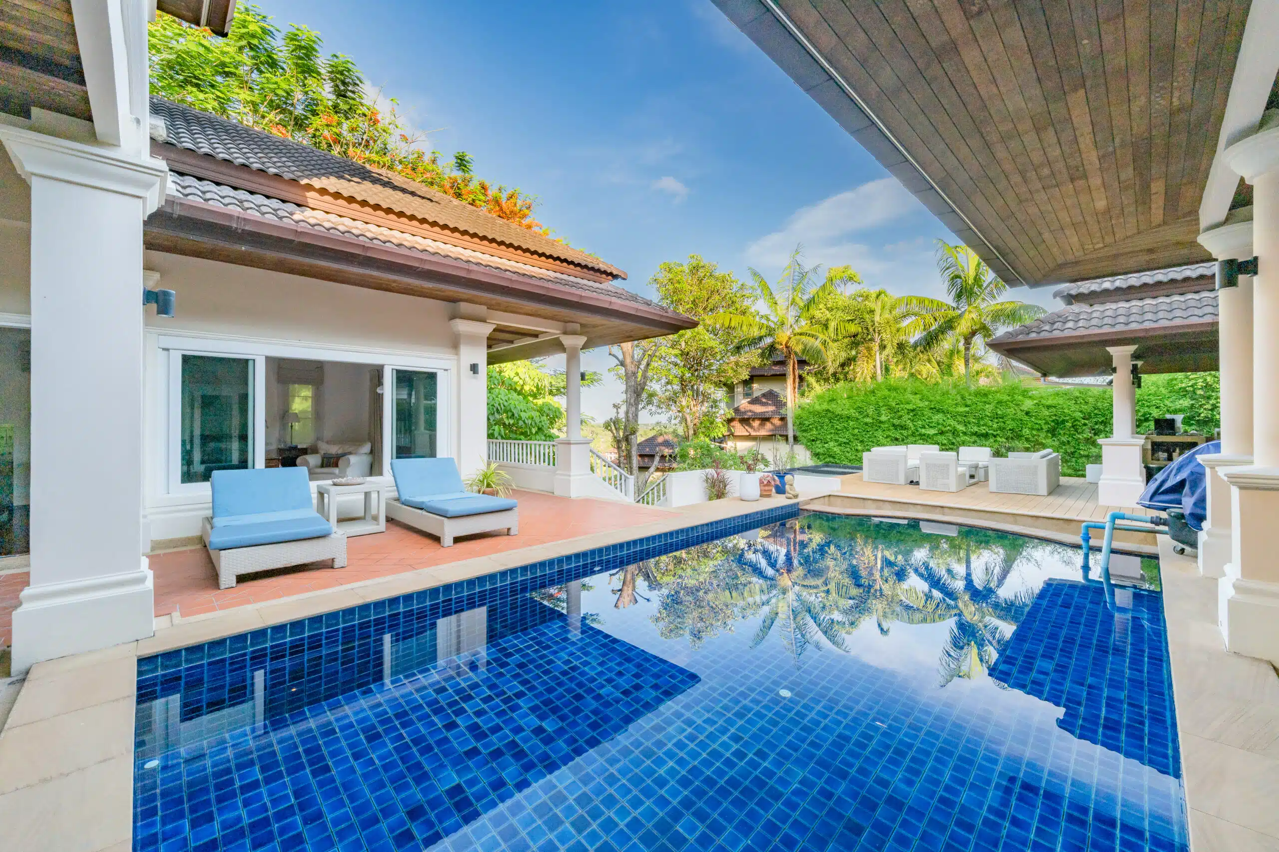Lakewood Hills Villa in Phuket: Outdoor pool area with sun loungers and greenery